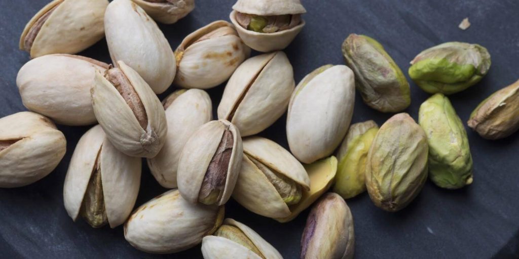 Where do pistachios grow naturally